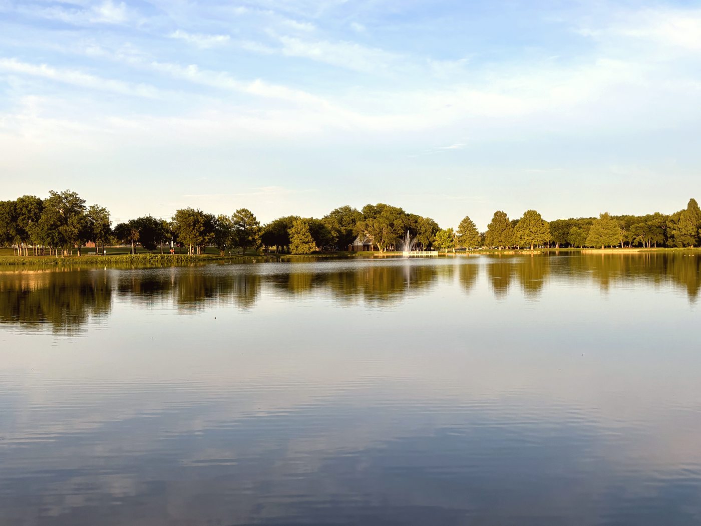 Walking path along McKinney lake at sunrise
